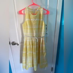 New with tags Calvin Klein yellow sleeveless dress.